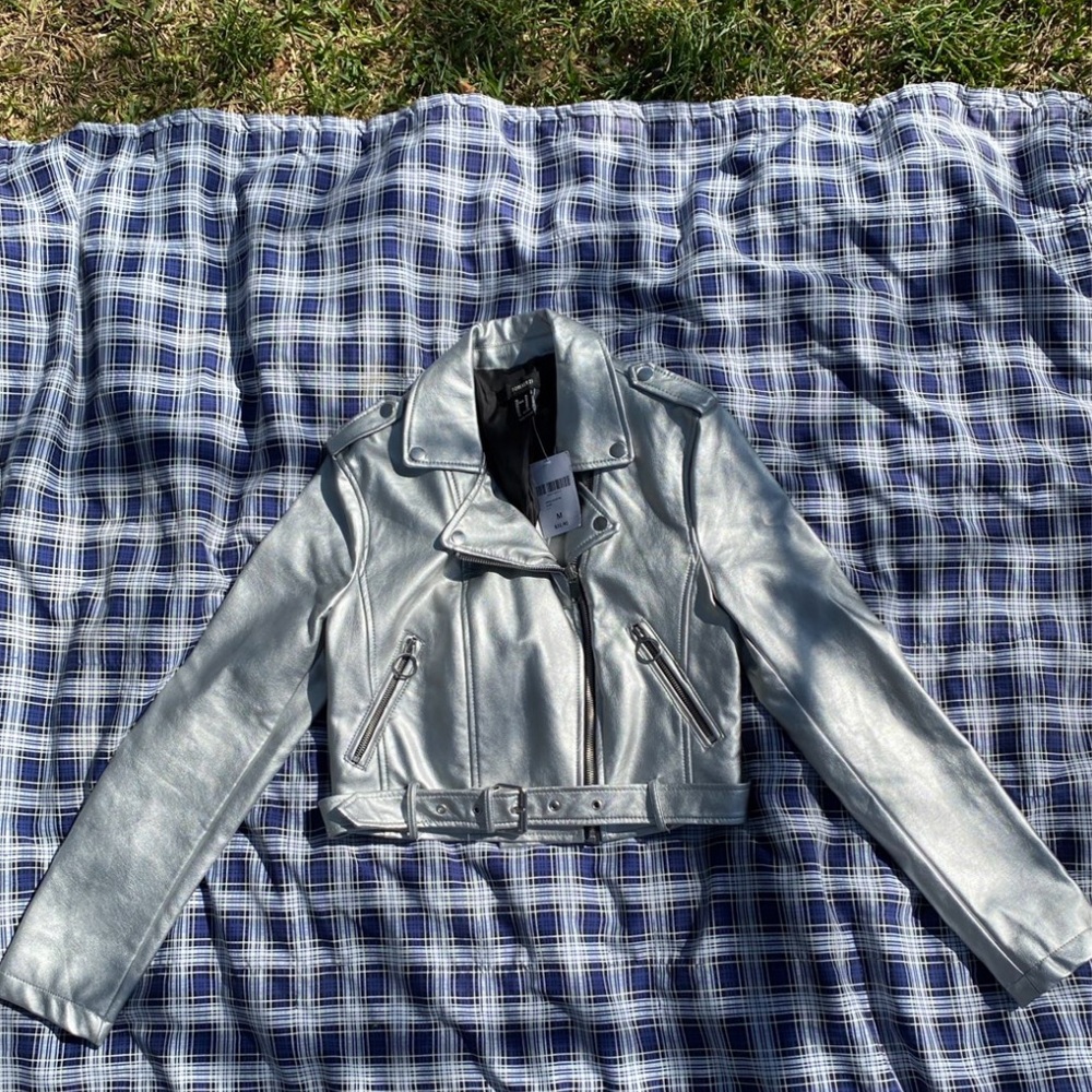 A size Medium silver faux leather crop jacket
